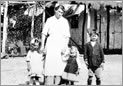 Image: A photo of Babette and her children outside the family home