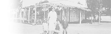 Babette Augustin and children in front of the family farm from the diary of Babette Augustin